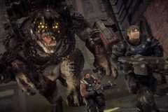 Cole and Baird running from a Locust monster in Gears of War Reloaded.